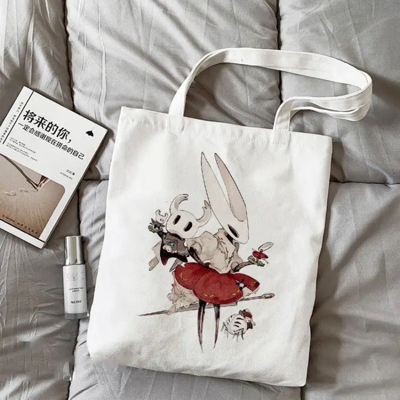 Tote Bag Canvas Print - กระเป๋าผ้าแคนวาสลายการ์ตูน Hollow Knight สำหรับใส่ของ กระเป๋าสะพายไหล่ กระเป๋าช้อปปิ้งลายการ์ตูน