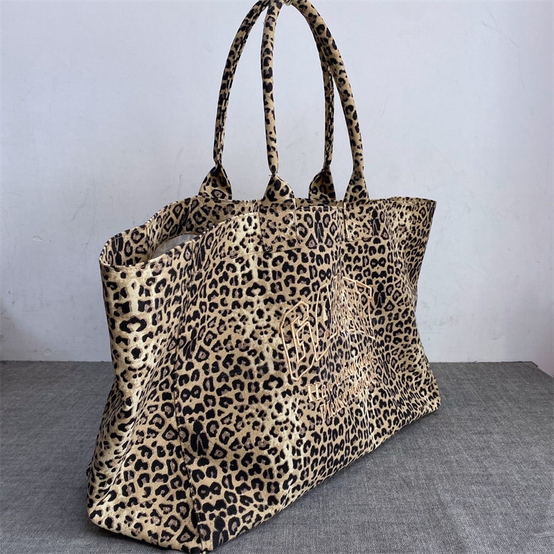 Tote Bag Canvas Print - กระเป๋าผ้าแคนวาสลายเสือดาวปักลายสำหรับทุกเพศ กระเป๋าถือแบบสบายๆ กระเป๋าช้อปปิ้งนำกลับมาใช้ใหม่ได้ กระเป๋าสะพายแฟชั่นสำหรับผู้ชายและผู้หญิง ใช้ได้ทุกวัน
